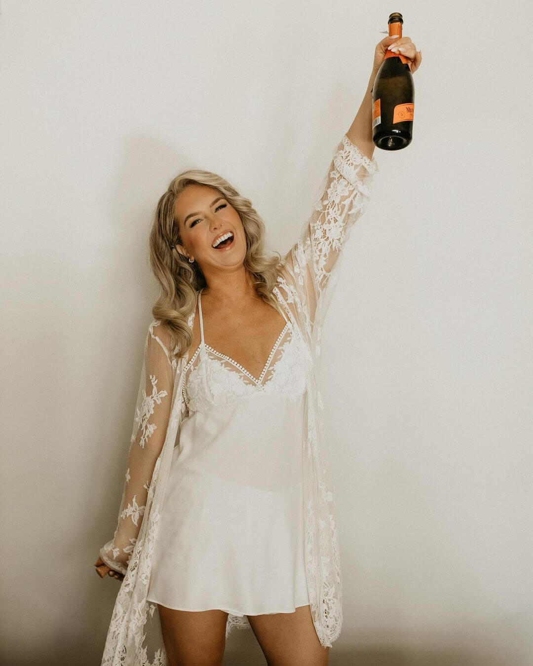 Real bride Kerstyn celebrations wearing Paris from Emanuella by Peter Trends
